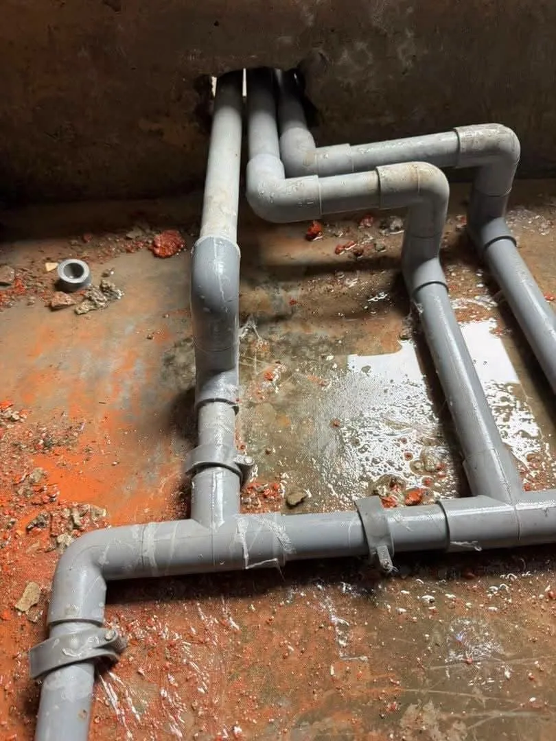 New bathroom waste pipes arranged below the floor