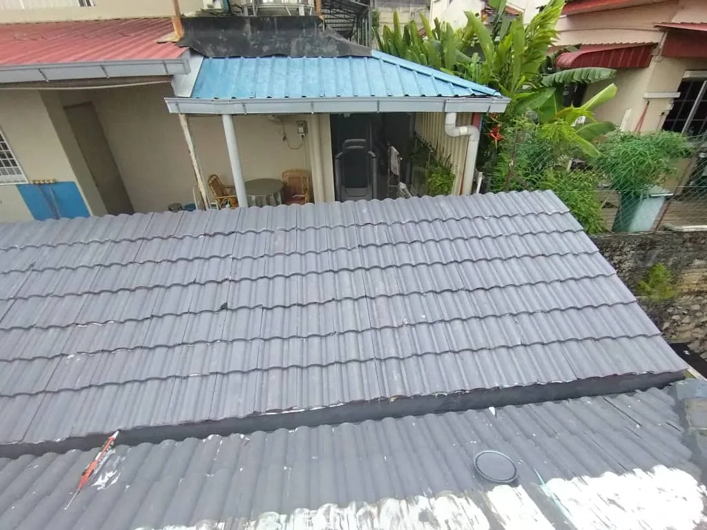 Completed tiled roof repair viewed from above