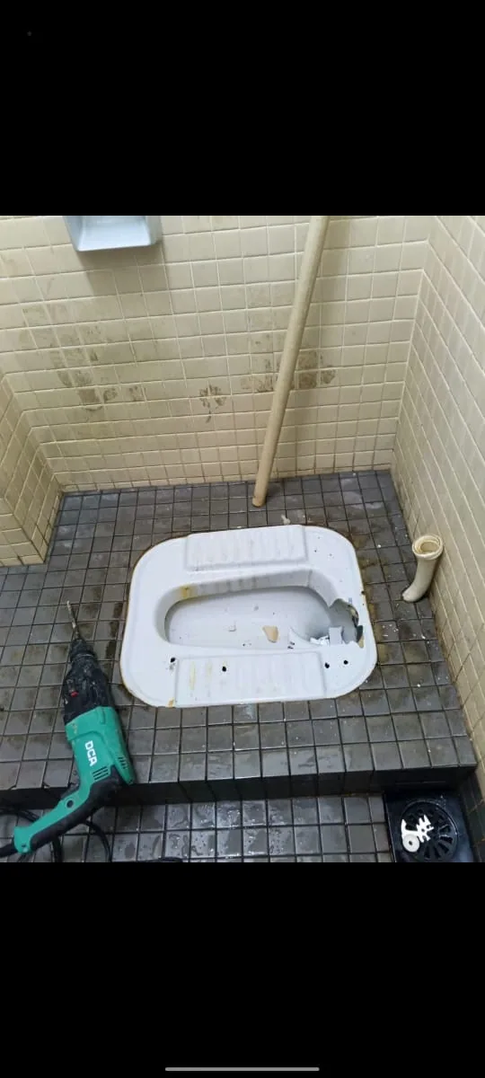 Squat toilet during renovation and replacement work