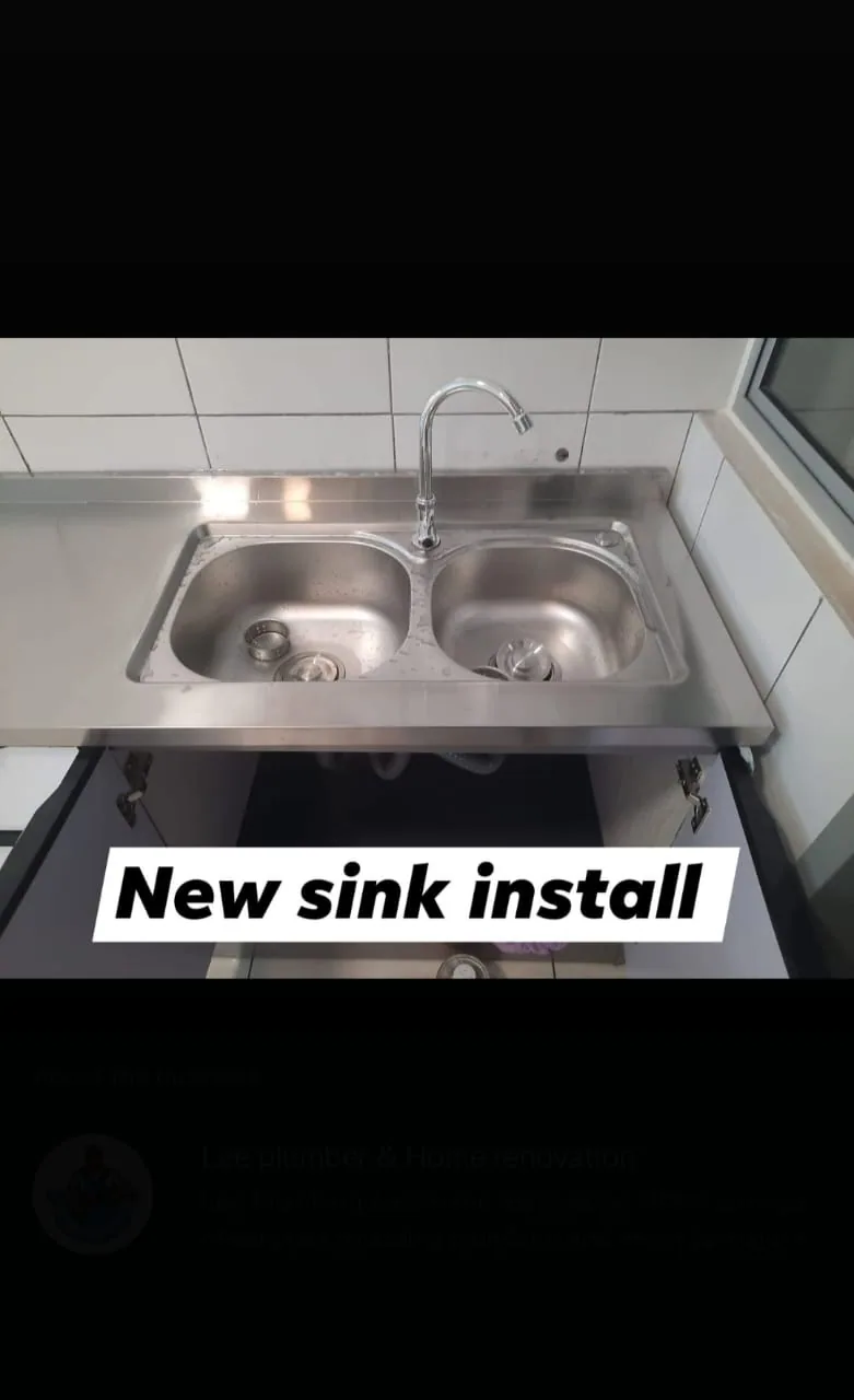 Completed stainless-steel double kitchen sink installation