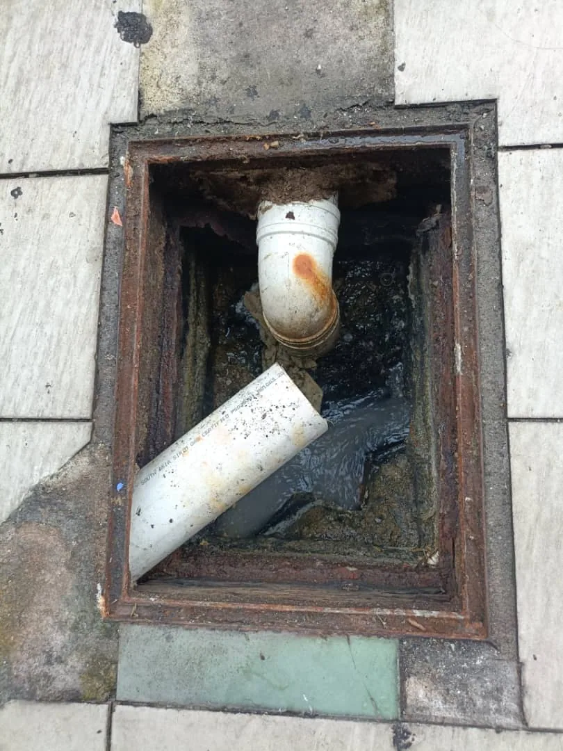 Disconnected underground drain pipe during chamber repair
